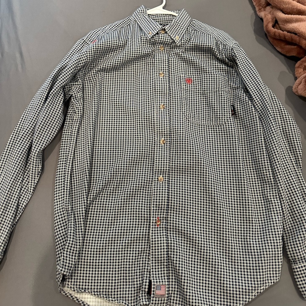 Ariat FR long sleeve shirt. Hard to tell but it’s Navy colored. Size medium